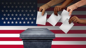 hands placing ballots in a ballot box with an American flag in the background